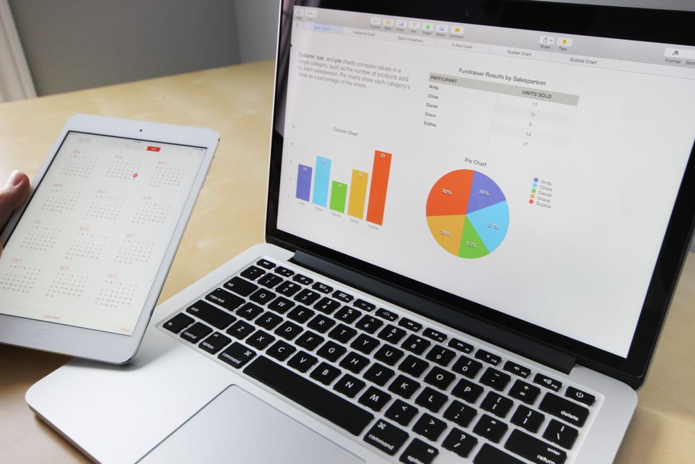 Analytics dashboards on a laptop and tablet